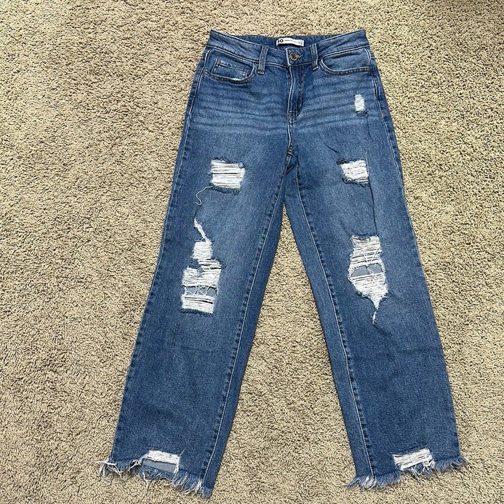 Distressed trendy jeans